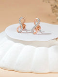 The Infinity Glow Studs